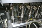 Used Capmatic Straight Line Automatic “Puck Style” Fragrance Line, Model Patriot L, S/N PA03101111, new 2004.  3/60/480V/20A.  6 Head Straight Line Vacuum Filler, Model Vacufill, S/N RV03101110, with...