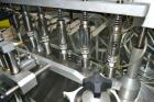 Used Capmatic Straight Line Automatic “Puck Style” Fragrance Line, Model Patriot L, S/N PA03101111, new 2004.  3/60/480V/20A.  6 Head Straight Line Vacuum Filler, Model Vacufill, S/N RV03101110, with...