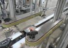 Complete Inline Bottle Filling and Packaging Line – Overflow Filler, Capper & Labeler