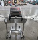 Complete Inline Bottle Filling and Packaging Line – Overflow Filler, Capper & Labeler