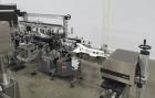 Complete Inline Bottle Filling and Packaging Line – Overflow Filler, Capper & Labeler