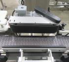Complete Inline Bottle Filling and Packaging Line – Overflow Filler, Capper & Labeler