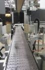 Complete Inline Bottle Filling and Packaging Line – Overflow Filler, Capper & Labeler
