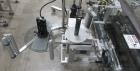 Complete Inline Bottle Filling and Packaging Line – Overflow Filler, Capper & Labeler