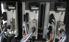 Complete Inline Bottle Filling and Packaging Line – Overflow Filler, Capper & Labeler