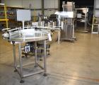 Used- Inline Filling Systems Complete Positive Displacement Piston Filling Line.