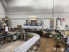 Used Inline Filling Systems Complete Liquid Filling Line. Line Consists of 10 Head Inline Fillers, Kapsall Model A6-R Capper with Integrated Cap Elevator and Centrifugal Cap Sorter, Dual Belt, Kapsal...