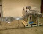 Used Kalish Liquid Bottle Filling Lineconsisting of: (1) Kalishtronic 8 head inline bottom up filler, Model KT12. (8) 5/8’’ diameter x 8-7/8’’ long diving nozzles, set up for approximately 946 ml. (8...