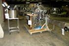 Used Kalish Liquid Bottle Filling Lineconsisting of: (1) Kalishtronic 8 head inline bottom up filler, Model KT12. (8) 5/8’’ diameter x 8-7/8’’ long diving nozzles, set up for approximately 946 ml. (8...