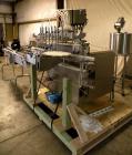Used Kalish Liquid Bottle Filling Lineconsisting of: (1) Kalishtronic 8 head inline bottom up filler, Model KT12. (8) 5/8’’ diameter x 8-7/8’’ long diving nozzles, set up for approximately 946 ml. (8...