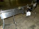 Used Kalish Liquid Bottle Filling Lineconsisting of: (1) Kalishtronic 8 head inline bottom up filler, Model KT12. (8) 5/8’’ diameter x 8-7/8’’ long diving nozzles, set up for approximately 946 ml. (8...