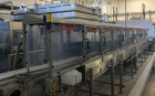 Used Krones Hot Fill Line. Last running juice in 325ml and 475ml containers at 200 Bottle Per Minute. Line consists of Krones Contifeed RS preform feeder, Krones Contiform blow molder, Krones Modufil...