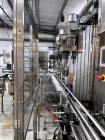 Used Complete Norland Filling Line – 66 BPM / 4000 BPH | 25oz Bottles