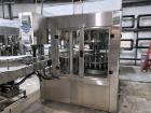 Used Complete Filling line for Bottle, manufactured by Norland. Running 25oz Bottles