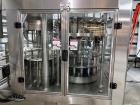 Used Complete Filling line for Bottle, manufactured by Norland. Running 25oz Bottles