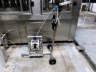 Used Complete Filling line for Bottle, manufactured by Norland. Running 25oz Bottles