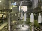 Complete Sidel ESL Bottle Filling Line with Blow Molder, Capper, Sleeving & Casing