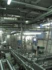 Used Tetra Pak Tetra Top TT3 Filling Machine.  Maximum capacity 9,000 units per hour, 3/50 hz/400V, filling volumes 0.13, 0.19 or 0.26 gallons (500, 750, 1000 ml), (2) Tetra cappers, CE certified.