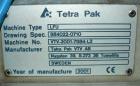 Used Tetra Pak Tetra Top TT3 Filling Machine.  Maximum capacity 9,000 units per hour, 3/50 hz/400V, filling volumes 0.13, 0.19 or 0.26 gallons (500, 750, 1000 ml), (2) Tetra cappers, CE certified.
