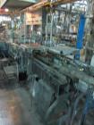 Used Complete Theile Paint Can Filling Line.  Line consists of a General Conveyor Systems semi-automatic can depalletizer, Mateer Burt 4086 roll through labeler with Valco cold glue lap seal, Thiele ...