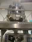 Used Guangdong Vertical Form Fill Seal (VFFS) Packaging Machine with 10-Head Combination Scale