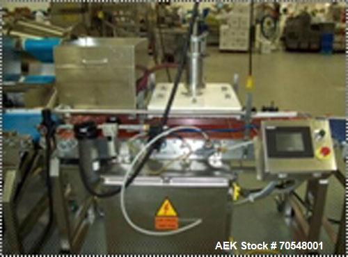 Used Complete Pizza Processing and Packaging Line.  Line consists of Pizzamatic sauce depositors, cheese shredders, transfer conveyors, Pizzamatic waterfall cheese applicator, sausage applicator, pep...