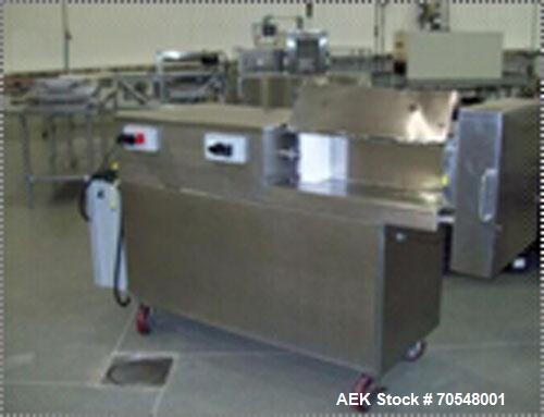 Used Complete Pizza Processing and Packaging Line.  Line consists of Pizzamatic sauce depositors, cheese shredders, transfer conveyors, Pizzamatic waterfall cheese applicator, sausage applicator, pep...