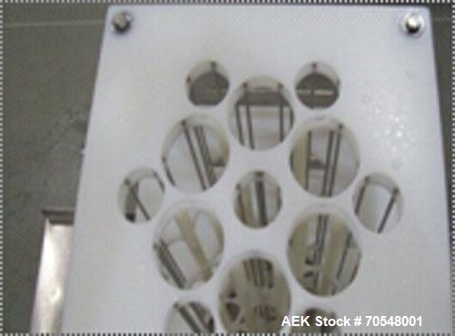 Used Complete Pizza Processing and Packaging Line.  Line consists of Pizzamatic sauce depositors, cheese shredders, transfer conveyors, Pizzamatic waterfall cheese applicator, sausage applicator, pep...