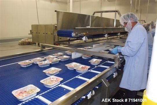 Used Complete Flexline Frozen Meal Kitchen and Assembly Production Line. Accuracy: Precision meal component placement within a tray. Variety: 11 depositing stations for meal components, sauce, glaze ...