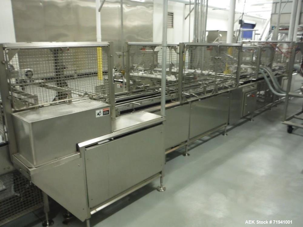 Used Complete Flexline Frozen Meal Kitchen and Assembly Production Line. Accuracy: Precision meal component placement within a tray. Variety: 11 depositing stations for meal components, sauce, glaze ...