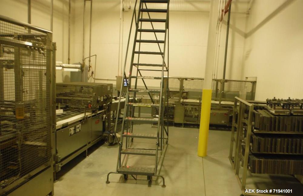 Used Complete Flexline Frozen Meal Kitchen and Assembly Production Line. Accuracy: Precision meal component placement within a tray. Variety: 11 depositing stations for meal components, sauce, glaze ...