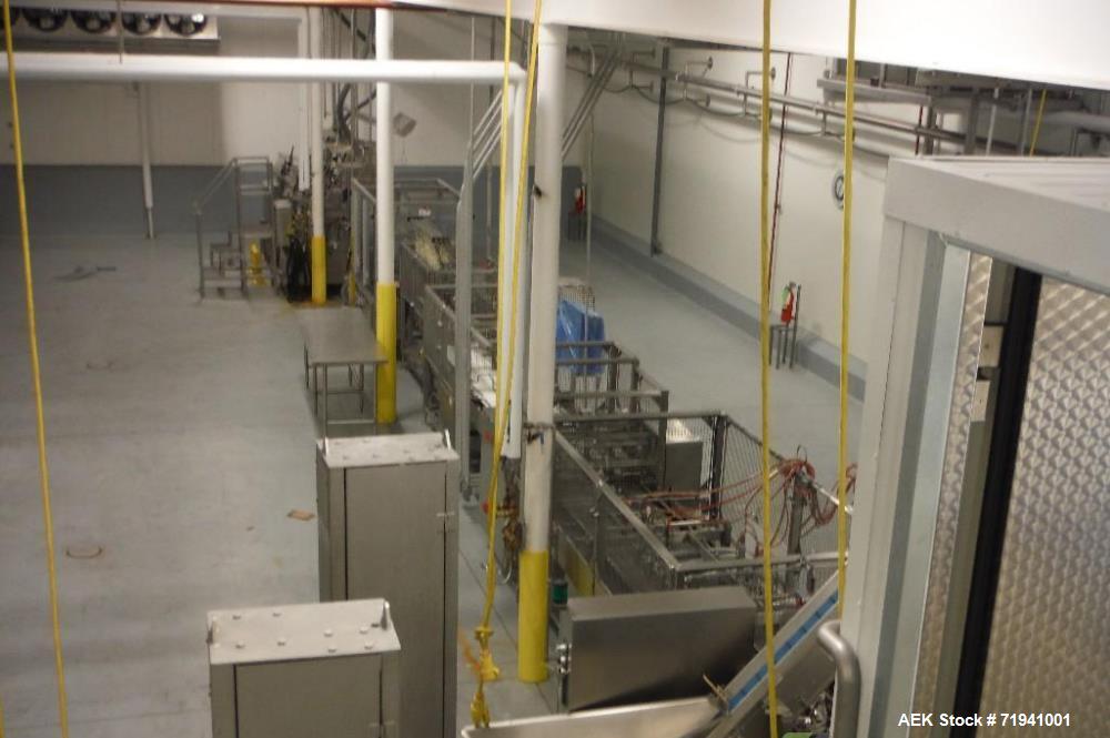 Used Complete Flexline Frozen Meal Kitchen and Assembly Production Line. Accuracy: Precision meal component placement within a tray. Variety: 11 depositing stations for meal components, sauce, glaze ...
