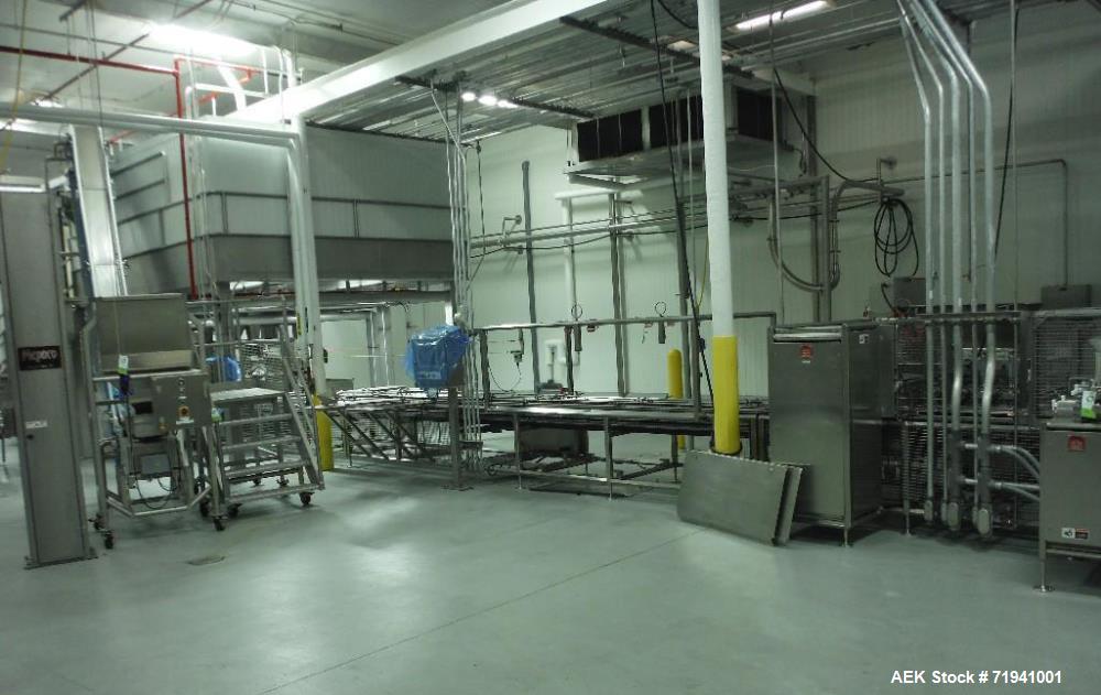 Used Complete Flexline Frozen Meal Kitchen and Assembly Production Line. Accuracy: Precision meal component placement within a tray. Variety: 11 depositing stations for meal components, sauce, glaze ...