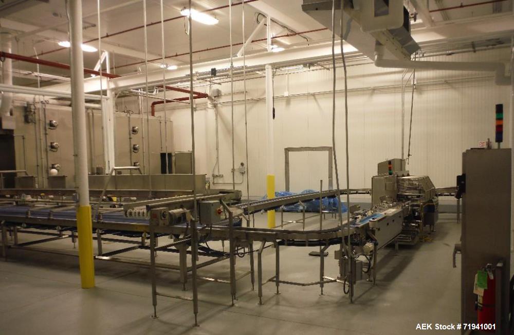 Used Complete Flexline Frozen Meal Kitchen and Assembly Production Line. Accuracy: Precision meal component placement within a tray. Variety: 11 depositing stations for meal components, sauce, glaze ...