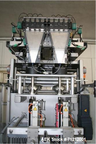 Used Pouch Packaging line. Capacity 2 x 80 trays / minute. Line consists of Hassia model TC55 Chipboard hooded tray former for top load packing, Rovema model BC260 pouch packager discharging to top l...
