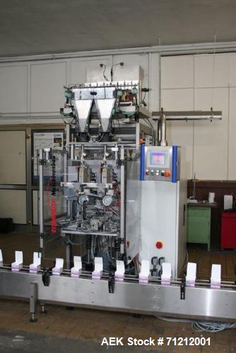 Used Pouch Packaging line. Capacity 2 x 80 trays / minute. Line consists of Hassia model TC55 Chipboard hooded tray former for top load packing, Rovema model BC260 pouch packager discharging to top l...