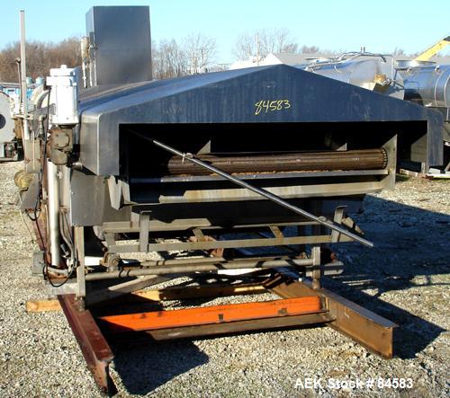 USED: Heat & Controls corn chip line, model CC-2.0 fryer, serial#178556. 58" wide x 21' long fry bed, wire woven mesh. . Stainless steel frame and hood. Seasoning hopper with36" long x 2" diameter fe...