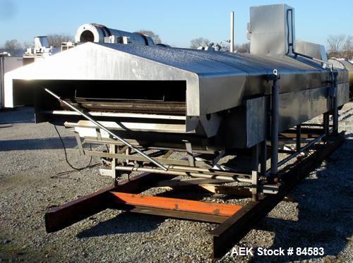 USED: Heat & Controls corn chip line, model CC-2.0 fryer, serial#178556. 58" wide x 21' long fry bed, wire woven mesh. . Stainless steel frame and hood. Seasoning hopper with36" long x 2" diameter fe...