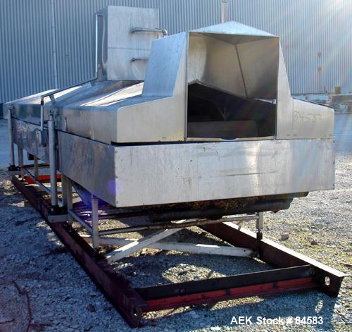 USED: Heat & Controls corn chip line, model CC-2.0 fryer, serial#178556. 58" wide x 21' long fry bed, wire woven mesh. . Stainless steel frame and hood. Seasoning hopper with36" long x 2" diameter fe...