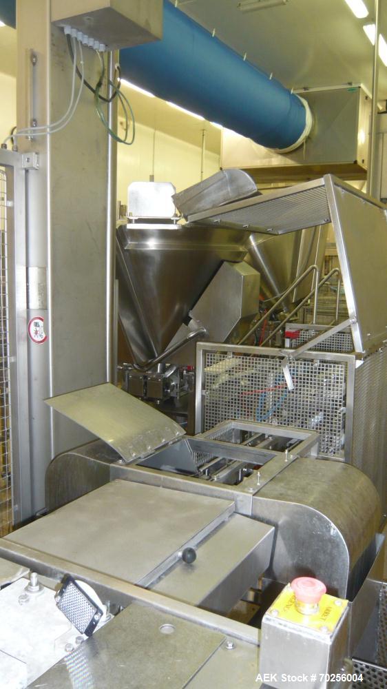 Used Mondini Line for Packaging Dough. (1) Unfeeder for cups. (2) 2 Mondini dosers. (3) Mondini sealer. Stainless steel.