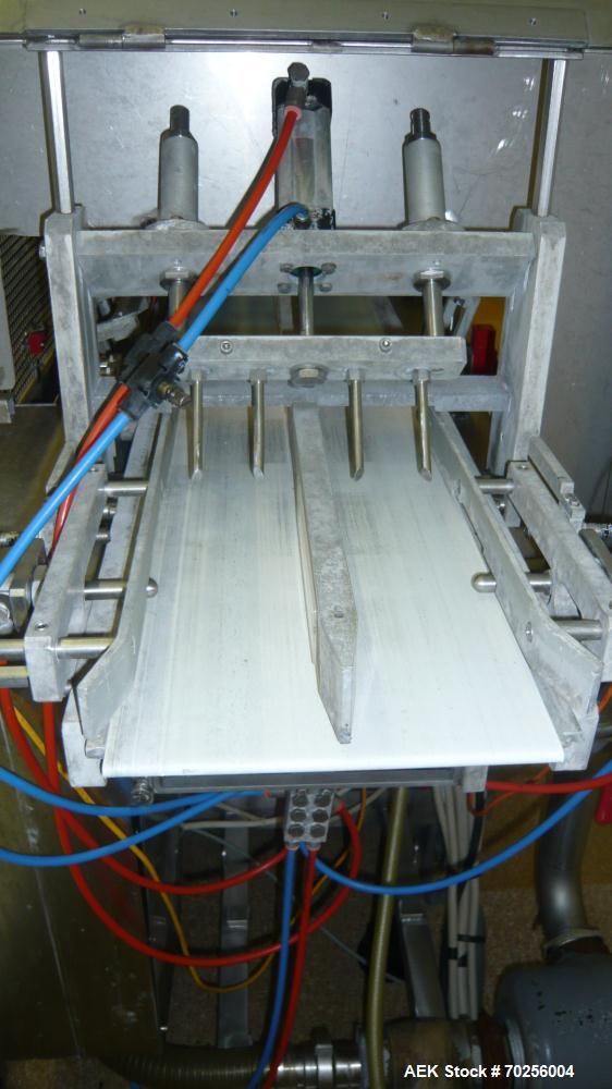 Used Mondini Line for Packaging Dough. (1) Unfeeder for cups. (2) 2 Mondini dosers. (3) Mondini sealer. Stainless steel.