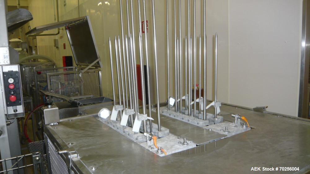 Used Mondini Line for Packaging Dough. (1) Unfeeder for cups. (2) 2 Mondini dosers. (3) Mondini sealer. Stainless steel.