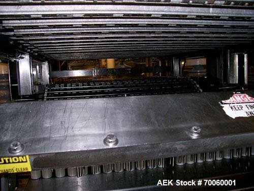 Used Vitaline 12 Wide Complete Novelty Stick Line. With stick inserter, controls and pumps. Single, coaxial and three flavor hoppers, Anderson wrapper, chillers, flat and tapered tooling and support ...