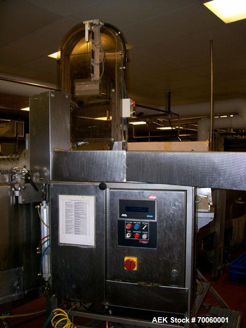 Used Vitaline 12 Wide Complete Novelty Stick Line. With stick inserter, controls and pumps. Single, coaxial and three flavor hoppers, Anderson wrapper, chillers, flat and tapered tooling and support ...