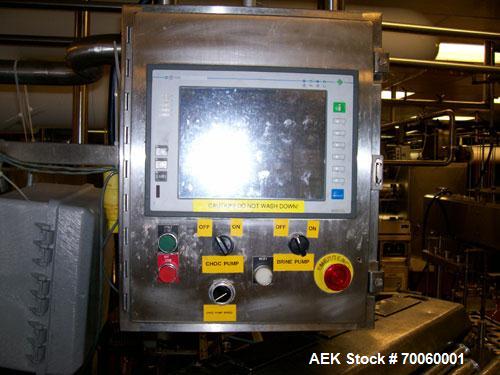 Used Vitaline 12 Wide Complete Novelty Stick Line. With stick inserter, controls and pumps. Single, coaxial and three flavor hoppers, Anderson wrapper, chillers, flat and tapered tooling and support ...