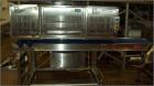 Used Complete Pizza Processing and Packaging Line.  Line consists of Pizzamatic sauce depositors, cheese shredders, transfer conveyors, Pizzamatic waterfall cheese applicator, sausage applicator, pep...