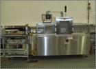 Used Complete Pizza Processing and Packaging Line.  Line consists of Pizzamatic sauce depositors, cheese shredders, transfer conveyors, Pizzamatic waterfall cheese applicator, sausage applicator, pep...