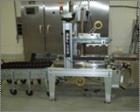 Used Complete Pizza Processing and Packaging Line.  Line consists of Pizzamatic sauce depositors, cheese shredders, transfer conveyors, Pizzamatic waterfall cheese applicator, sausage applicator, pep...