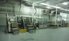 Used Complete Flexline Frozen Meal Kitchen and Assembly Production Line. Accuracy: Precision meal component placement within a tray. Variety: 11 depositing stations for meal components, sauce, glaze ...