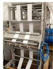 Used- Pouch Packaging line. Capacity 2 x 80 trays / minute. Line consists of Hassia model TC55 Chipboard hooded tray former ...